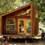 Wood Small Cabin Front at Spring Lake, Foxlin Architects